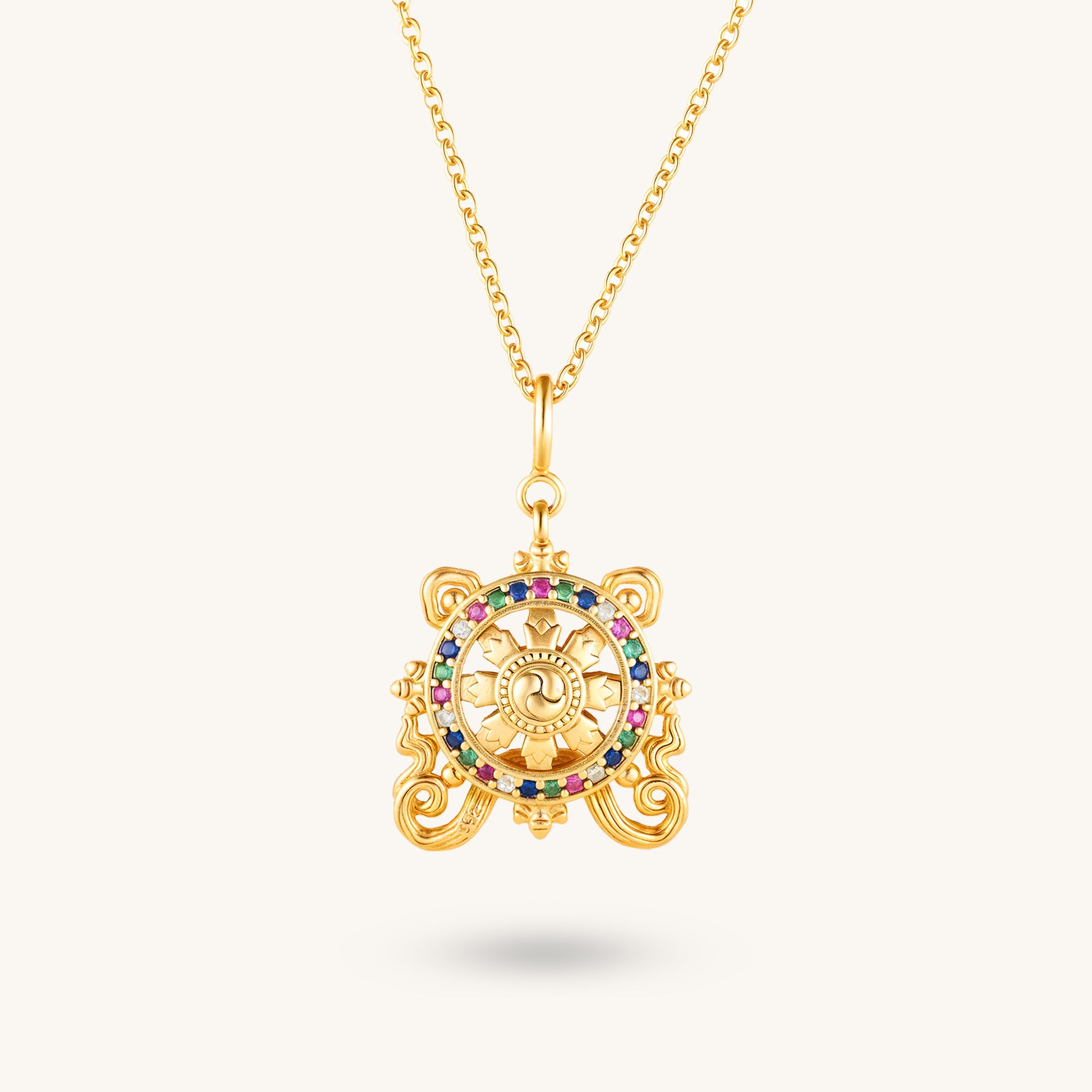 Golden Dharma Wheel – Spinning Wisdom Pendant