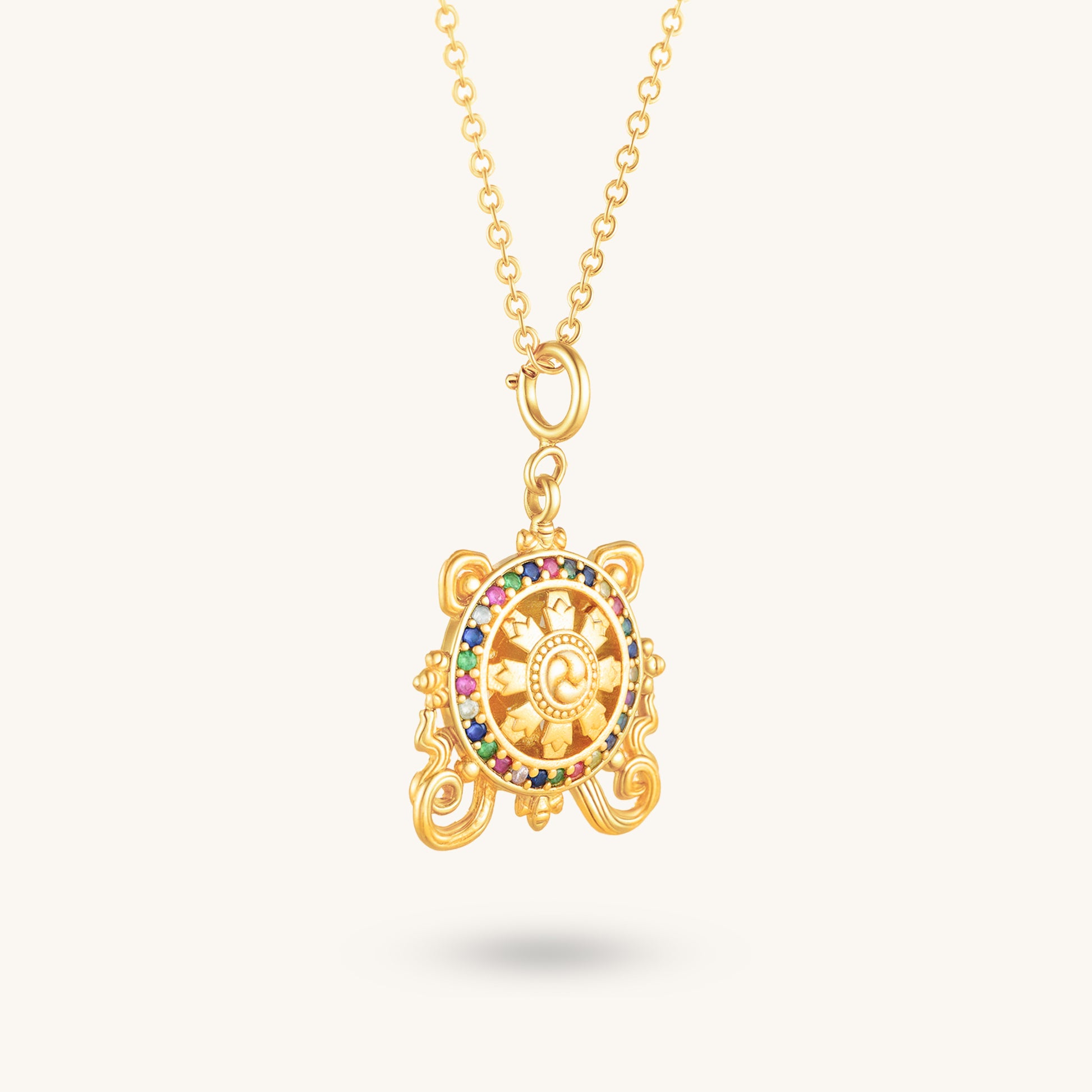 Golden Dharma Wheel – Spinning Wisdom Pendant