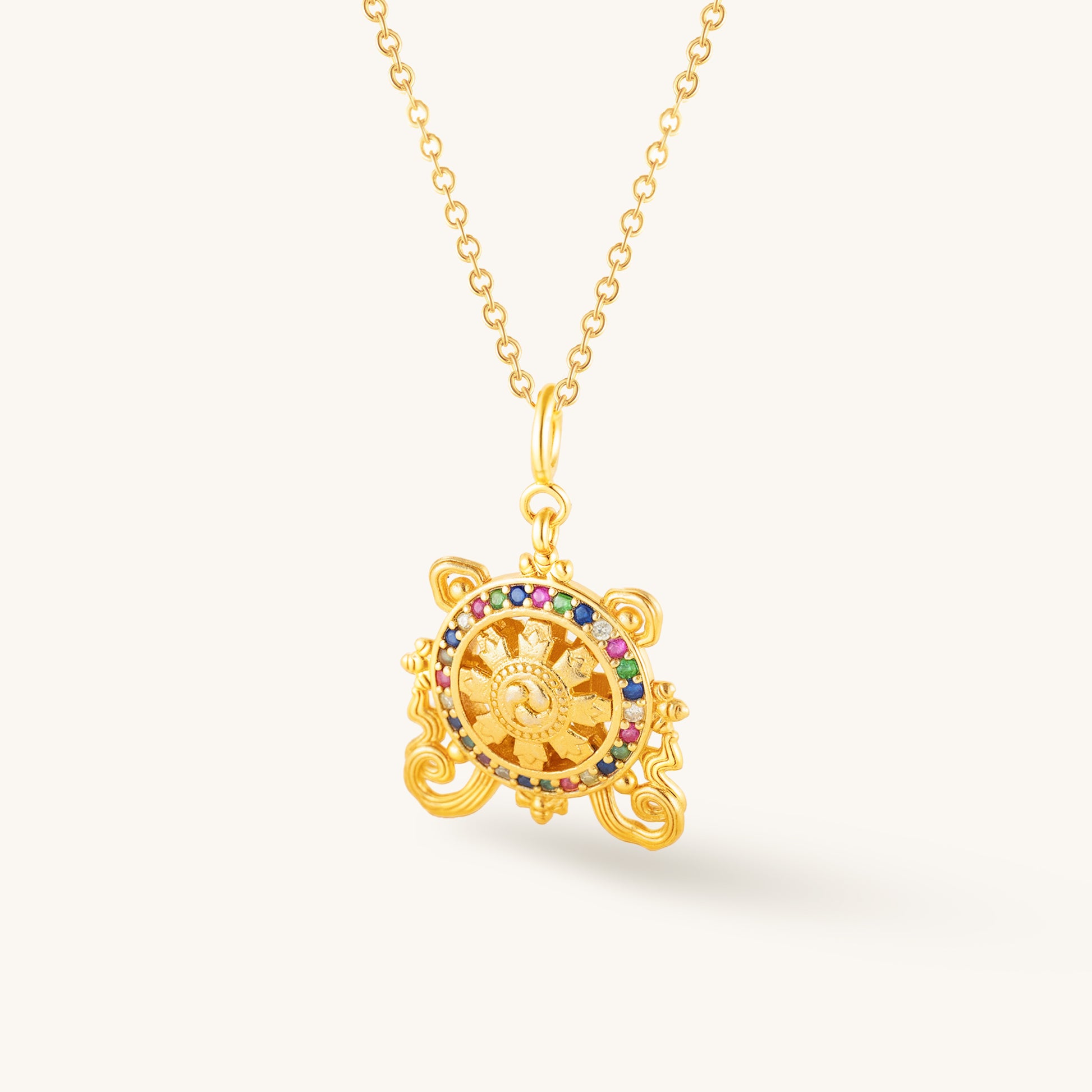 Golden Dharma Wheel – Spinning Wisdom Pendant