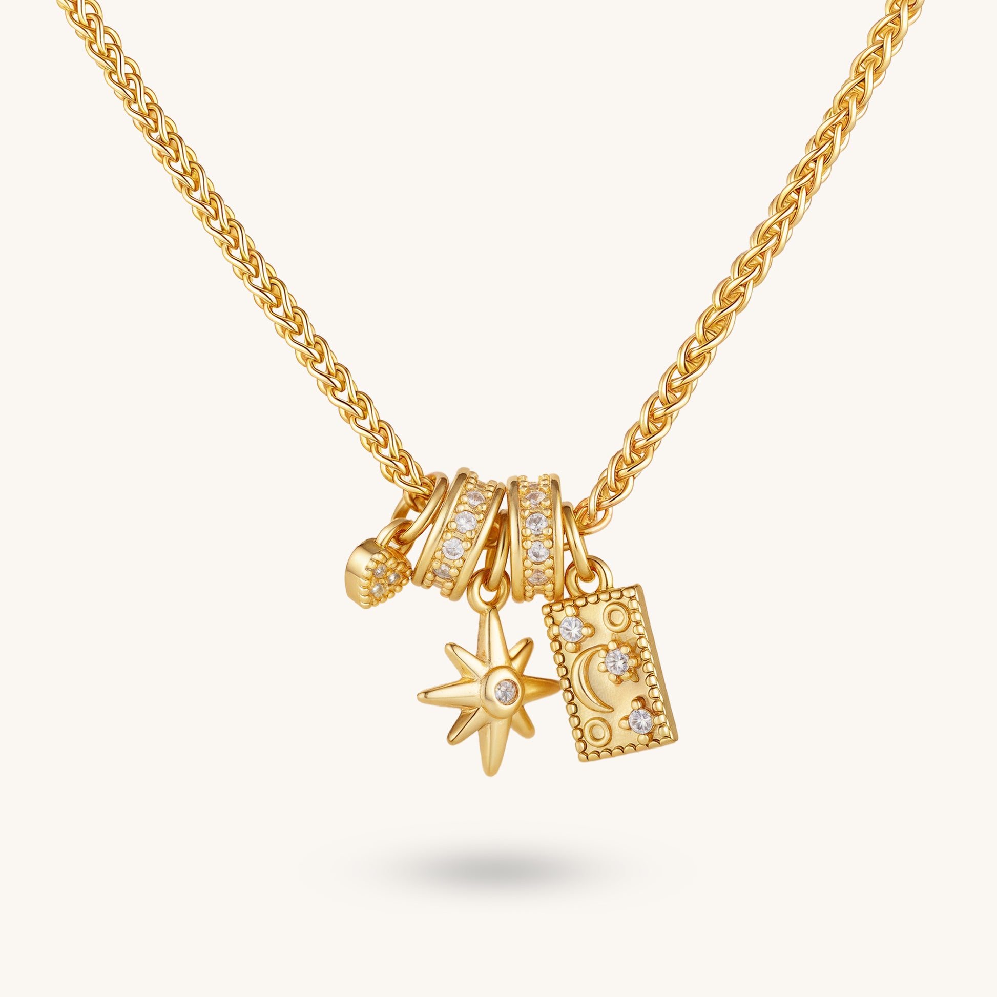 Stellar & Lunar Harmony – Layered Star, Moon, Ring & Crystal Pendant