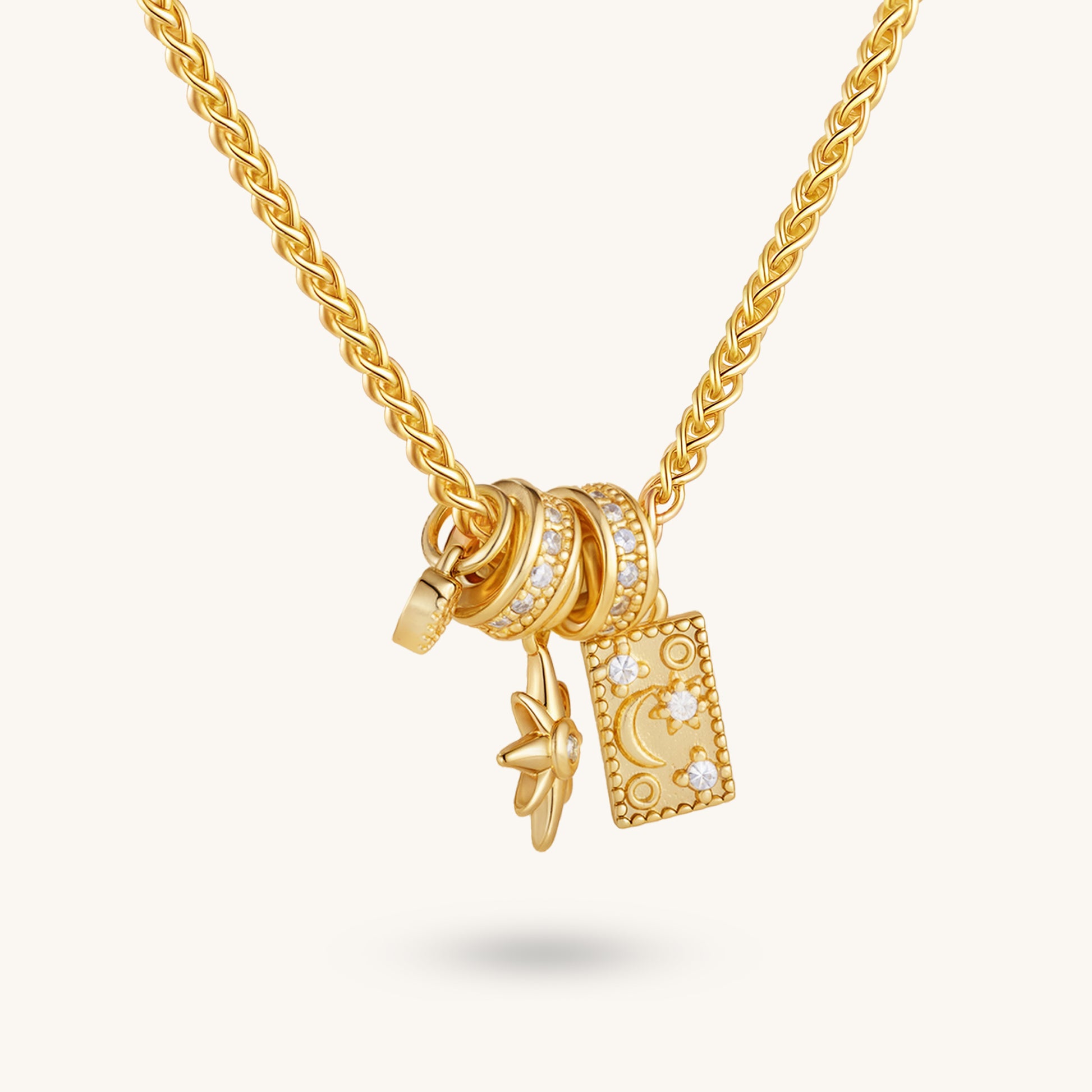 Stellar & Lunar Harmony – Layered Star, Moon, Ring & Crystal Pendant